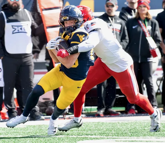 Hawkins leads game-winning drive as WVU tops UC, 45-42